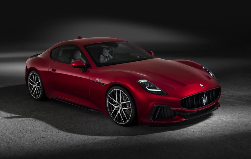 The interior of the 2024 Maserati GranTurismo with three screens is shown.